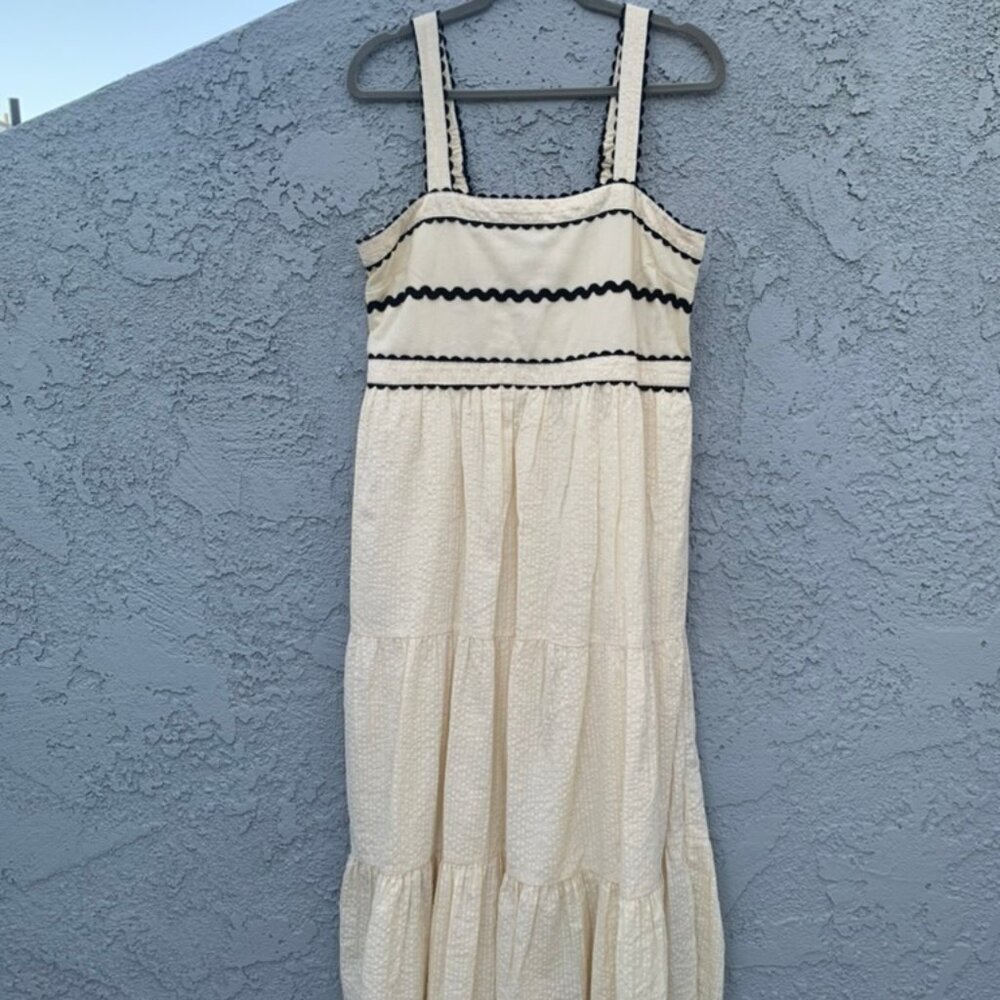 Classy cream and black scalloped dress